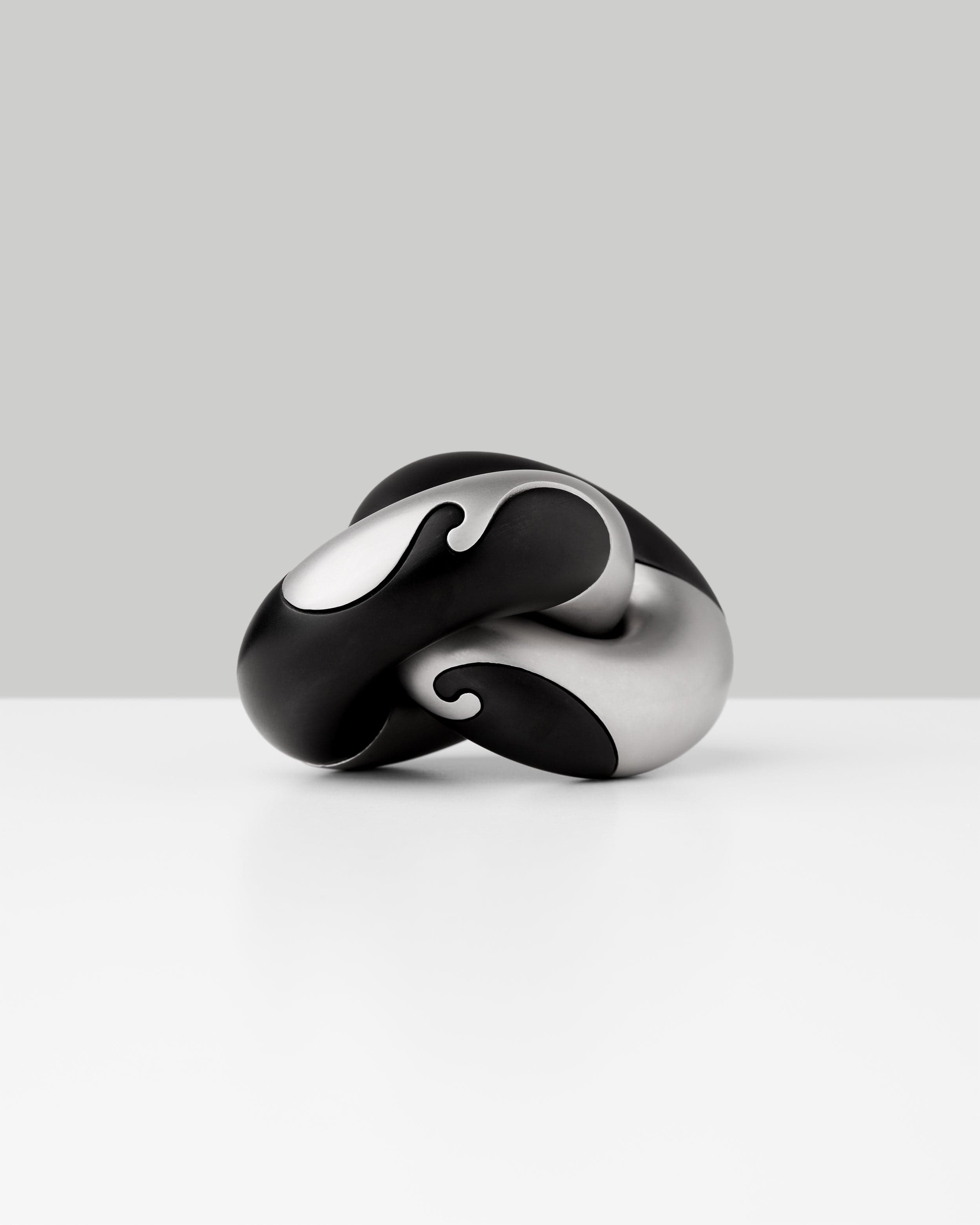 Wavelinks Puzzle in Vapor black and stainless steel